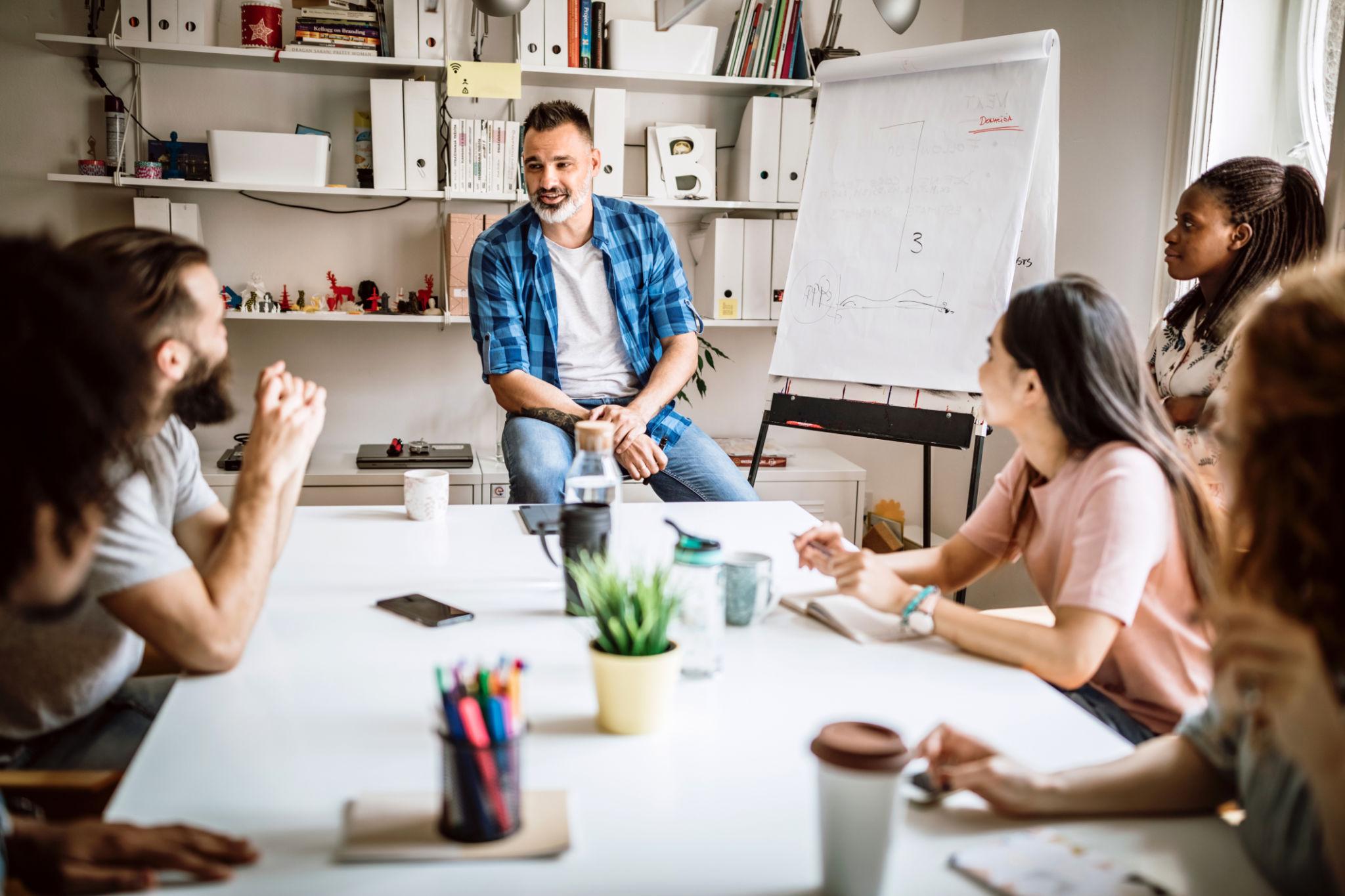 Growing nonprofit organization team discussing strategy